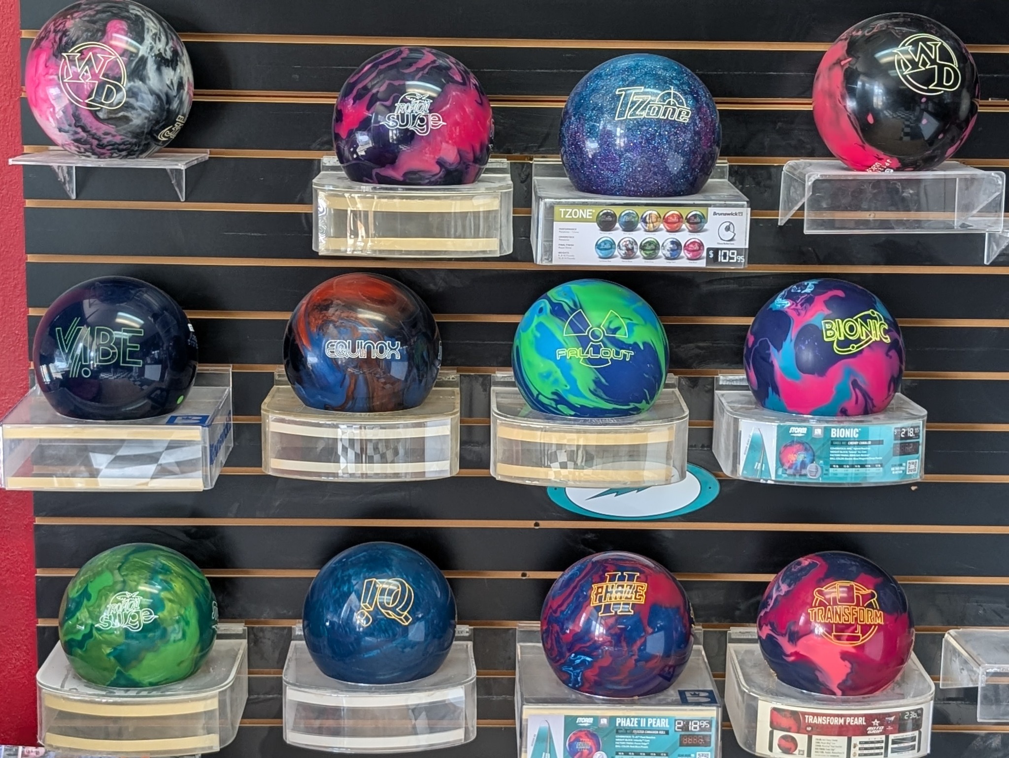 Featured bowling ball display wall inside Bowling Medic.